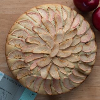 It’s time for apfelkuchen! We’re in Germany for #munich1972  and this apple cake called my name. Visit the blog for my #dairyfree #glutenfree take in this classic. (Also apparently I now bake logos into cake tops. We know who is to blame. @dvw2 ) Link in bio.